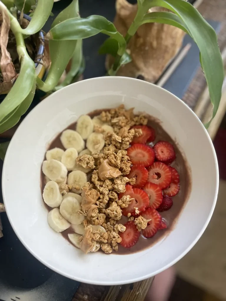 Colorful smoothie bowl made with fresh local fruit at Root to Rise Retreat in Puerto Rico