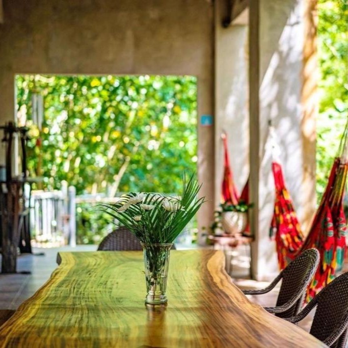 Relaxing at Dos Aguas B&B in Puerto Rico on arrival day of Root to Rise Retreat